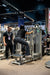 Rear three-quarter view of the GluteLeader GL-1006 Standing Hip Adductor in use