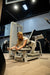 GluteLeader Kneeling Glute Kickback in use from the front