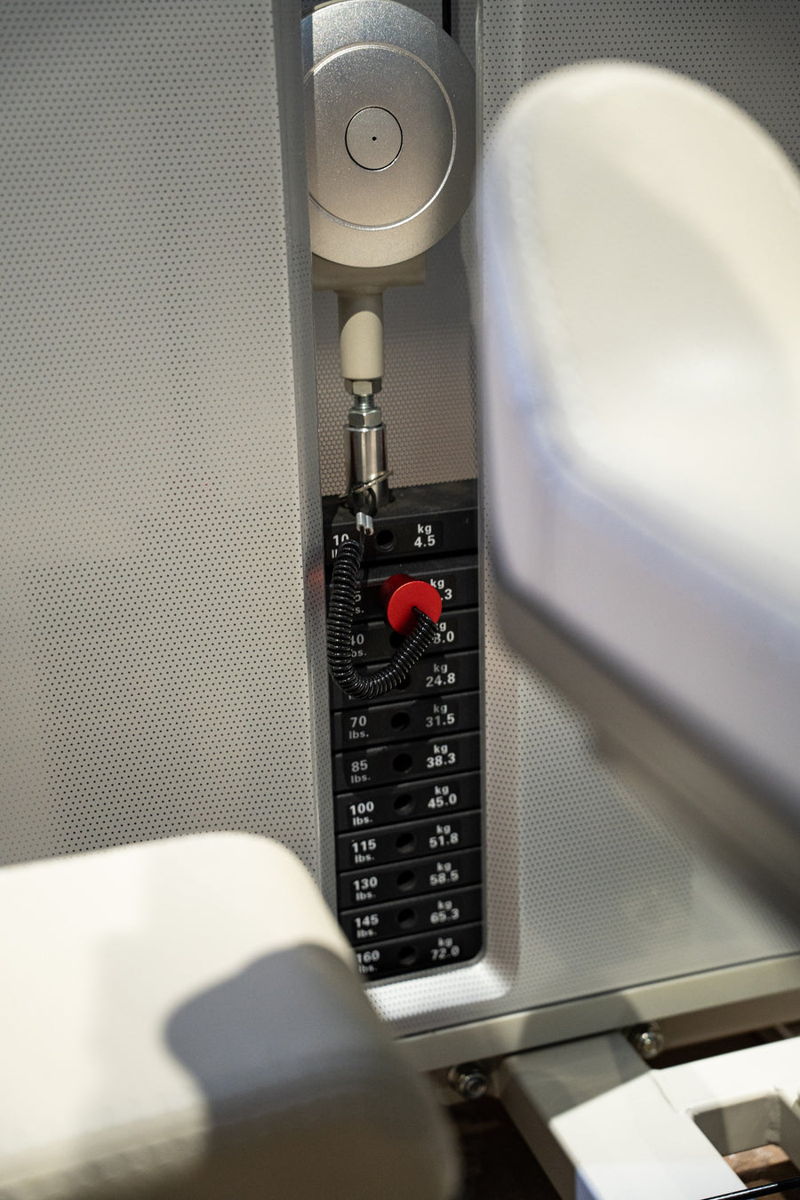GluteLeader Kneeling Glute Kickback selectorised weight stack detail