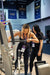 Athlete adjusting the GluteLeader Multi-Hip GL-1009 training position