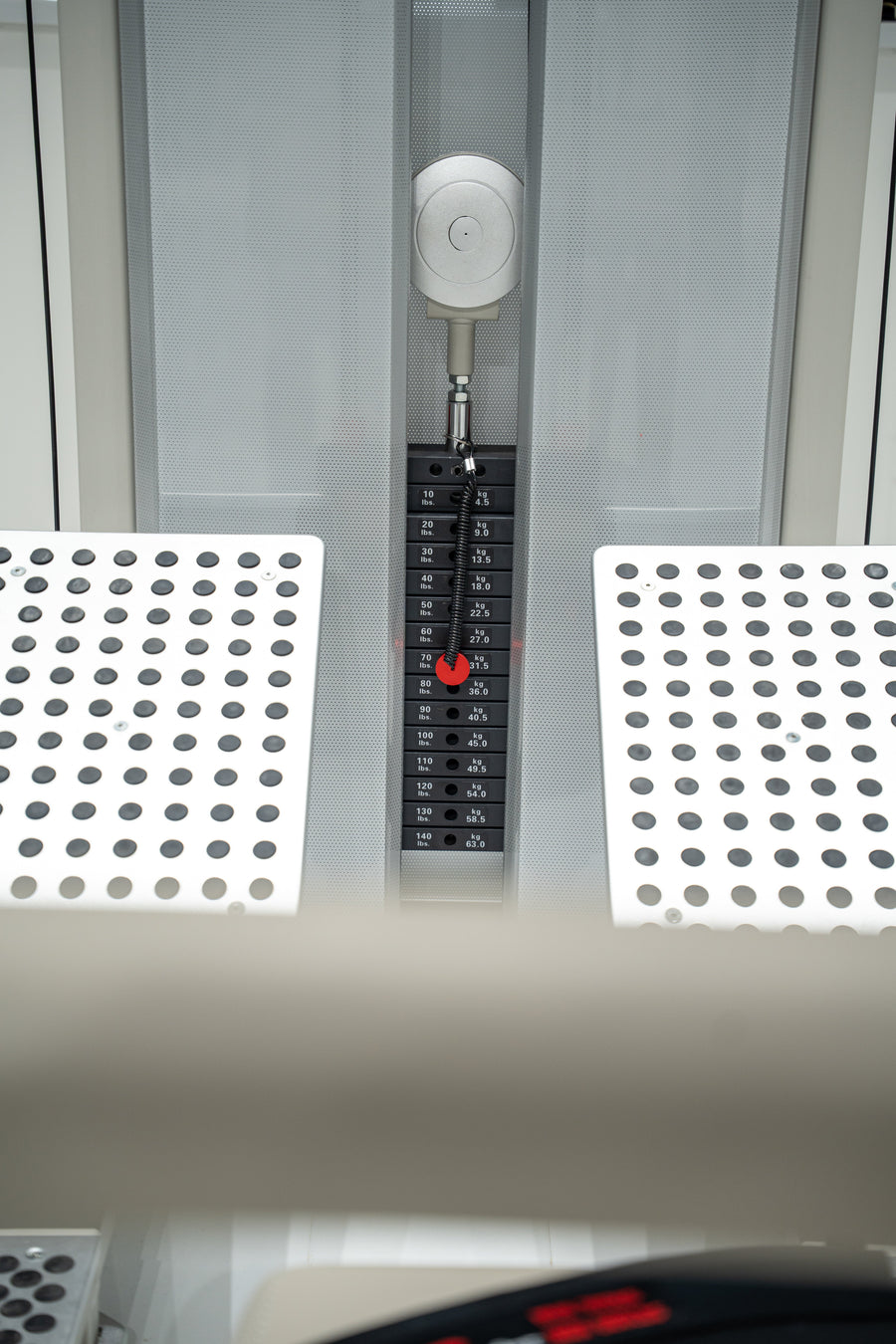 GluteLeader Pinloaded Glute Drive footplates and weight stack detail